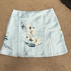 PRINCESS POLLY SILK FLORAL MINI SKIRT. SIZE US 8.